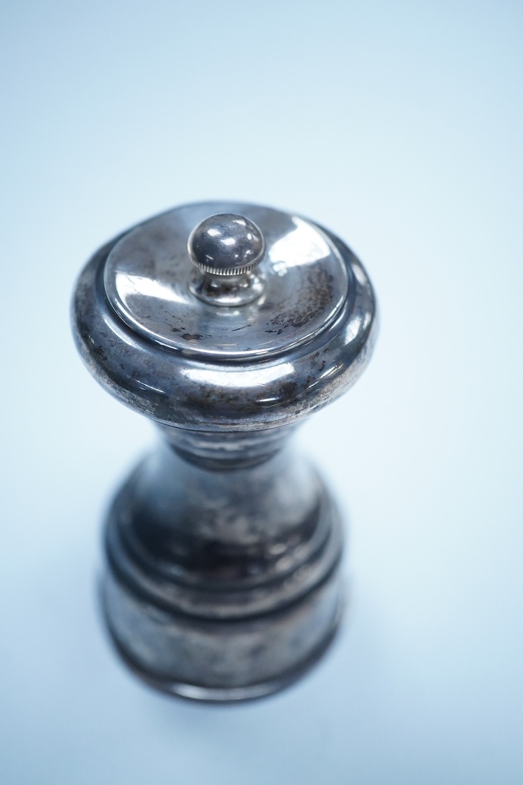 An Edwardian silver mounted pepper mill, by Joseph Braham, London 1908, height 84mm.